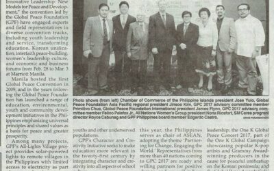 Group of individuals posing for a photo at a gpi's character and creativity initiative event as mentioned in an accompanying newspaper article.