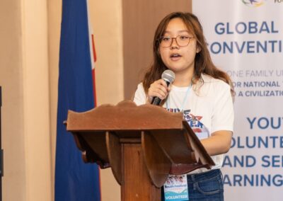 Volunteer speaking during the Youth Volunteerism & Service Learning Forum