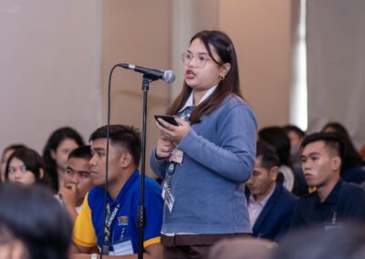 Youth participant posing a question during Session 1: The Impact of Volunteerism and Service Learning on Youth Empowerment and Leadership Development