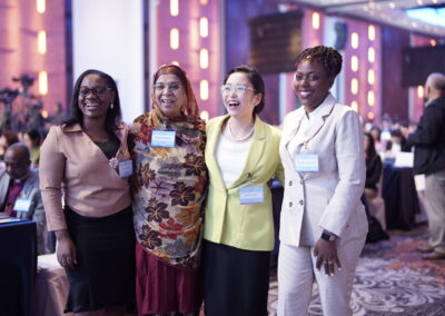 A community-driven group of women convening at an international business event.